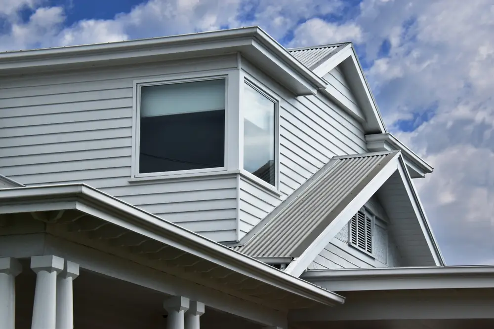 How Roof Type Affects Gutter Performance